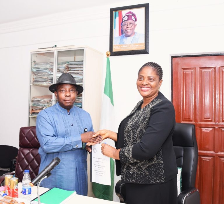 Outgoing Permanent Secretary, FMIST, Mrs. Esuabana Nko Asanye (right) Handing over Document to the incoming Permanent Secretary, Federal Ministry of Innovation, Science and Technology (FMIST) Mr. Philip Ndiomu Ebiogeh (left) today in Abuja.